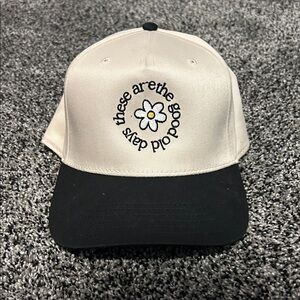 Black and Cream Trucker Hat with Embroidered Design